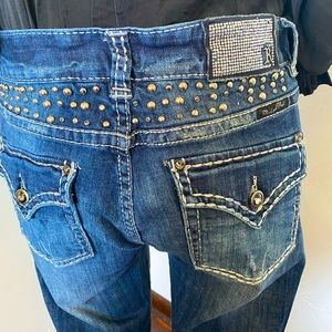 Rock & Roll Cowgirl blue jeans, 31 X 34